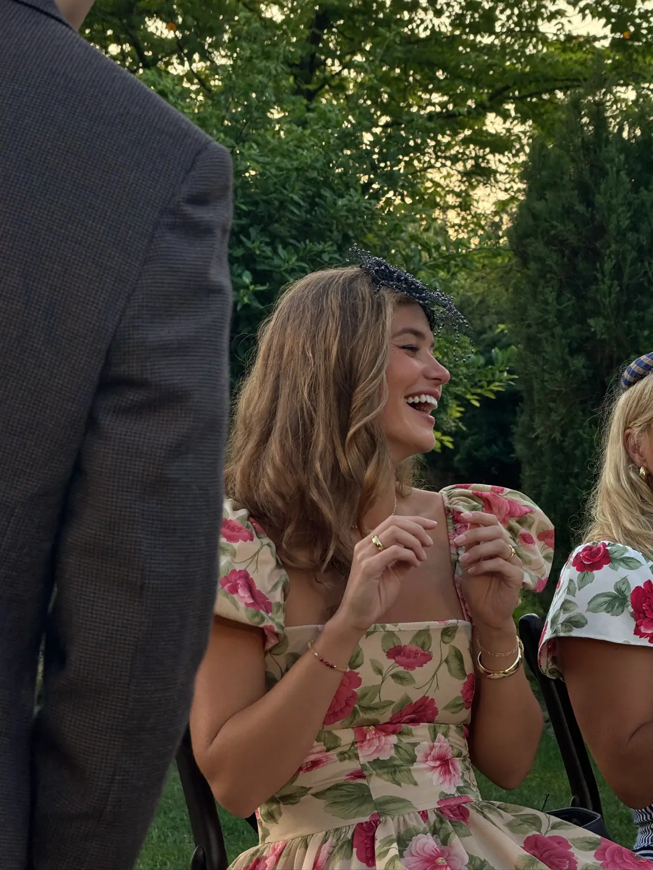 Gemma laughing at the garden wedding